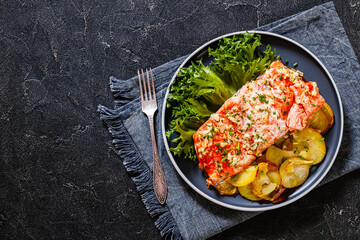 salmon with potato and tarragon sour cream sauce
