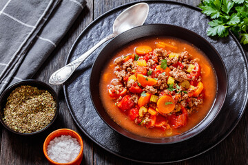 Hamburger Soup with barley and vegetables in bowl