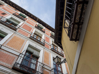 Picturesque houses of the city of Toledo, Spain, from below.