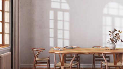 Farmhouse dining room with wooden table and chairs in white and beige tones. Plaster walls, boho interior design