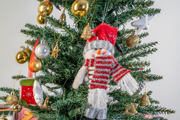 Decorated Christmas tree. Near different gift boxes on New year,New Year. Christmas. Winter holiday theme.