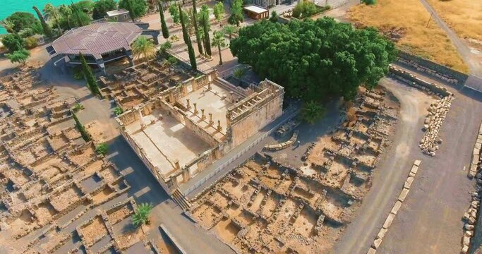 Capernaum was a fishing village established during the time of the Hasmoneans, located on the northern shore of the Sea of Galilee.