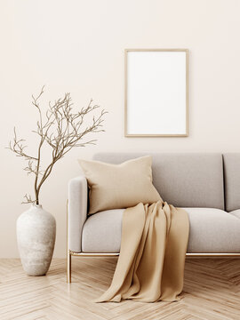 Wooden light brown frame mockup hanging in neutral warm beige interior with sofa and floor vase with tree branch. 3d illustration, 3d rendering