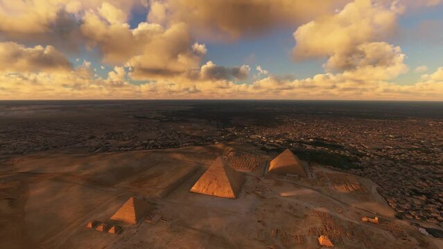 Aerial front view of the Pyramids of Giza, Pyramids of Giza at sunset in Egypt