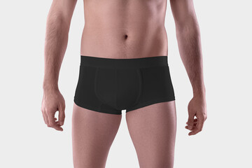 Mockup of black male boxers on the athletic body of a guy, brief underwear, isolated on background
