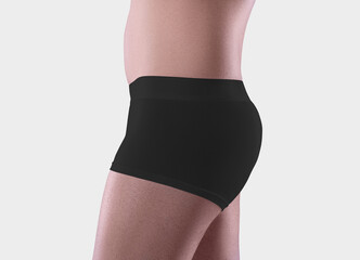 Mockup of black male boxers on the athletic body of a guy, brief underwear, isolated on background