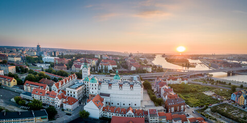 Zamek Książąt Pomorskich in Szczecin aerial panorama at sunrise.