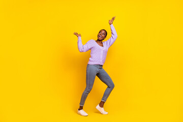 Fototapeta na wymiar Full body portrait of positive excited lady look empty space arm palms catch isolated on yellow color background