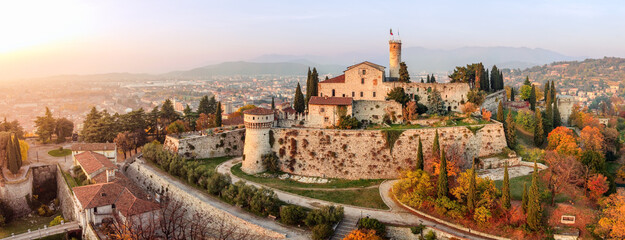 Panoramic drone view on medieval fortress Castello di Brescia, via del Castello and historical...
