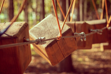 The bridges, ropes and ladders of the Adventure Park are designed for beginners among the tall trees. Adventure climbing in a high ropes course