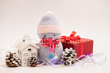 Celebrate christmas and happy new year on white.Handmade snowmans.