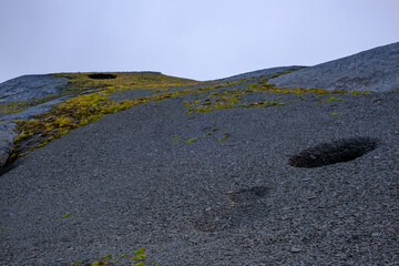 Buchi nel terreno scistico del Pizzo del Corvo, Gana Negra, Alta Valle di Blenio, Ticino, Svizzera