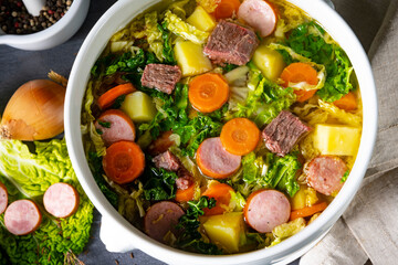 delicious savoy cabbage soup in white vase