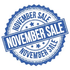 NOVEMBER SALE text on blue round stamp sign