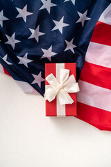 United States election design concept, American Flag over white table background with gift.