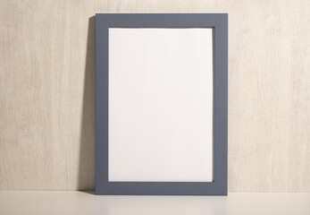 Frame mockup. Photo Mockup gray frame. For frames and posters design. Frame size A4. on beige background. blank photo frame border with copy space. close up
