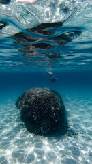 girl diving in mediterranean sea 
