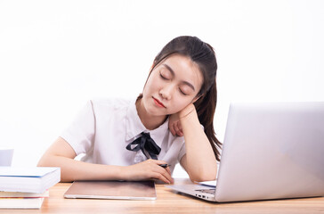 Asian female students taking an online class against a white background