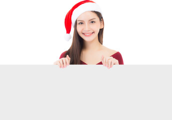 Portrait woman in Christmas holding board with space.