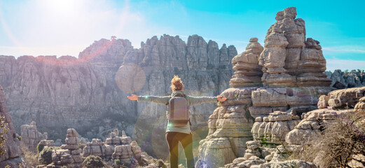 rear view of woman visiting Torcal- Spain - obrazy, fototapety, plakaty