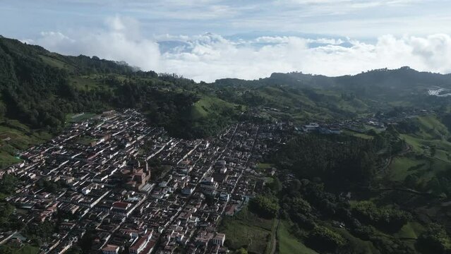 Aerial Drone Top Notch Above Jerico Colombia Zoom In Andean Mountain Valley City Epic Skyline and Green Hills
