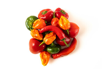 Peppers of different varieties on a white background.