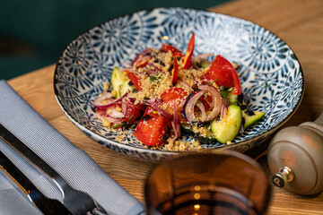 fresh tomato cucumber and onion salad in a restaurant