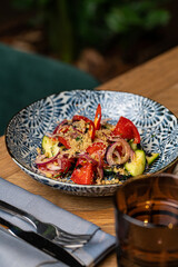 fresh tomato cucumber and onion salad in a restaurant