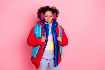 Photo of young pretty woman good mood wear many colorful clothes isolated over pink color background