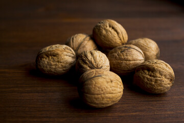 Walnuts on a brown wooden table
