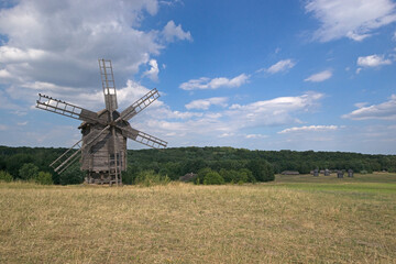 Fototapeta na wymiar Travel to old village with windmill
