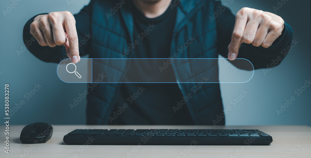 Poster data search technology search engine optimization. man's hands showing a search bar and a computer k