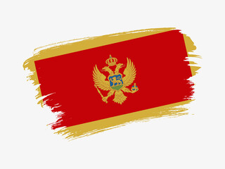 Montenegro flag made in textured brush stroke. Patriotic country flag on white background