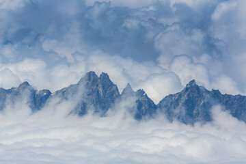 Beautiful alpine scenery in the Swiss Alps in winter, with dramatic cloudscape