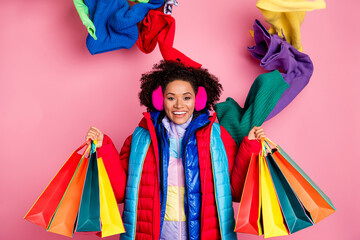Photo of young lovely girl shop boutique season discount present isolated over pink color background © deagreez
