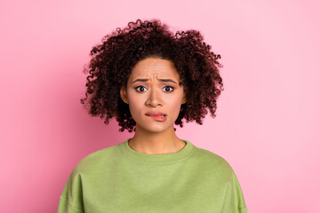 Photo of young pretty girl anxious afraid scared fail trouble frightened isolated over pink color background