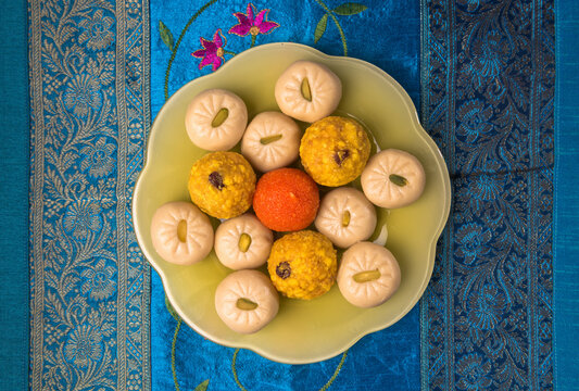 An Indian authentic sweet- Peda and Boondi laddu served in a plate. Indian dessert or assorted sweets shot from above.