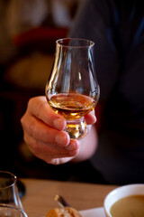 Tasting of single malt scotch whisky in whiskey bar in Edinburgh, UK