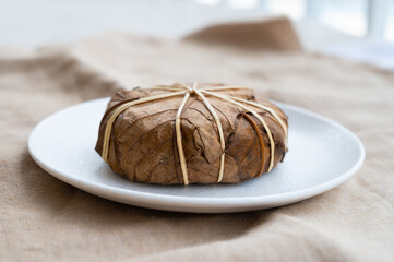 French mountains cheese banon wrapped in chestnut leaves made in Provence from unpasteurised goat milk