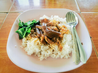 Must-try Thai food with pork leg rice