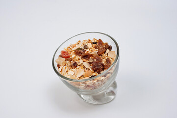 Muesli from oatmeal fruits and nuts, healthy diet food.