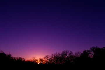 Purple sky with the sun going down