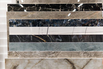 The kitchen and bathroom tile showroom showcases a new variation of floor and wall tiles for home...