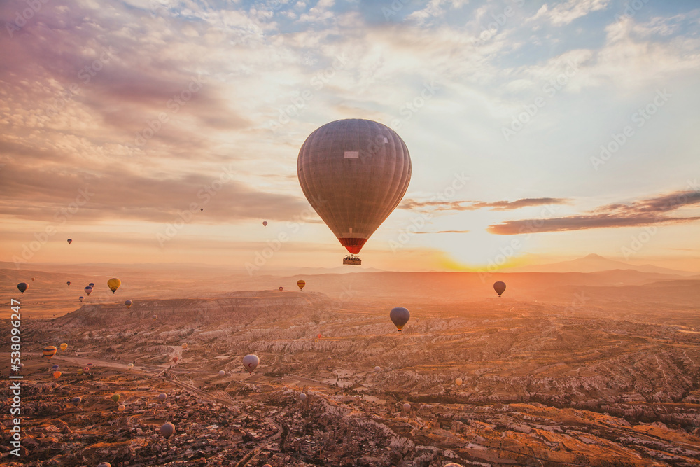 Sticker travel, many hot air balloons flying in sunrise sky, beautiful landscape