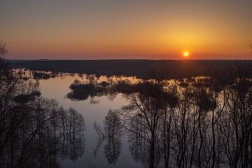 april sunrise over the lake