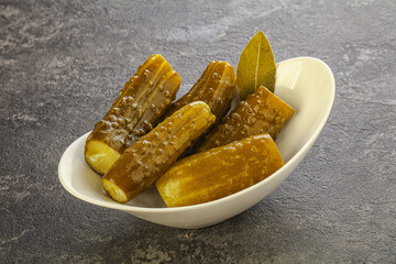 Marinated pickled cucumbers in the bowl