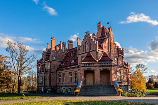 Jaunmoku Brick Medieval Castle Near Tukums, Latvia on a clear sunny autumn day, drone view