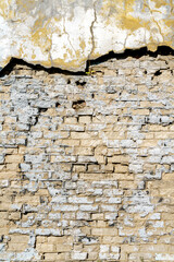 Old destroyed brick vintage wall. Unusual building background.