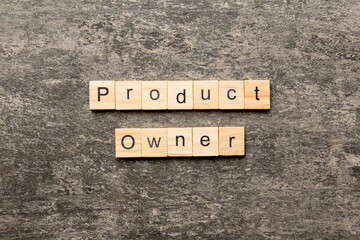product owner word written on wood block. product owner text on table, concept