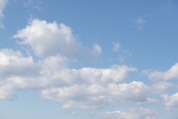 Fototapeta na wymiar Blue sky background with white clouds.